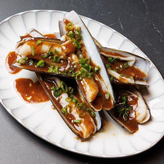 Excite your tastebuds with our razor clams painted with black …