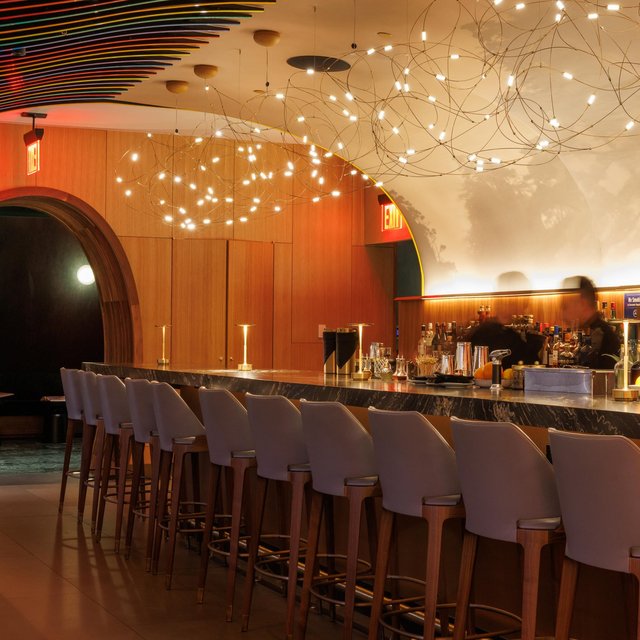 A dazzling mix of bold color, warm light, and craveable …